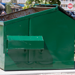 A green industrial bin